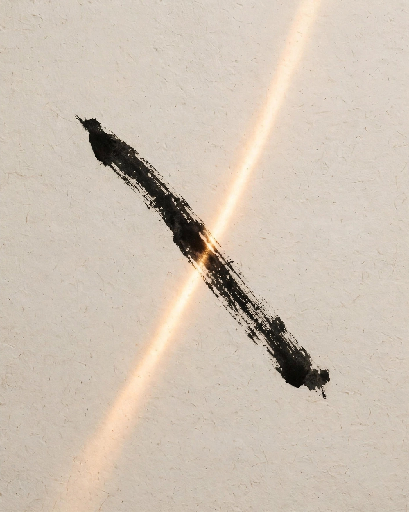 A single ink brushstroke and a line of light crossing on white paper